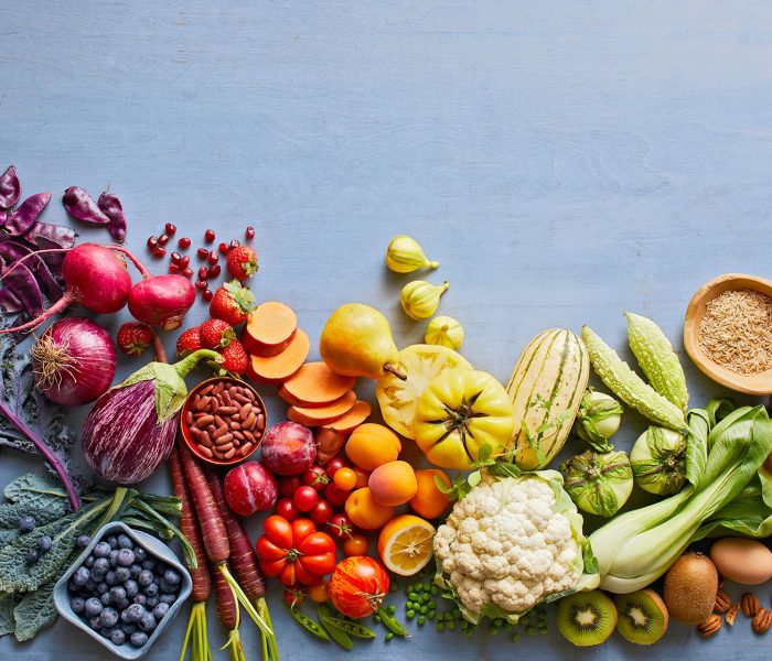 Какви са ползите от следването на растителната диета? - fruits vegetables legumes blue background 8a6d17df 50c1515a938e49afae2bc04b6ba0214c