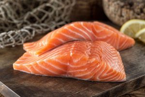 10 човешки храни, които са здравословни и за вашето куче - fresh salmon fillets by fudiogetty images 2000 02c1384d705a42e5a7801923a51b4377