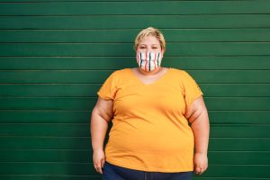 Кои са психологическите причини зад затлъстяването? - woman obese obesity overweight wall