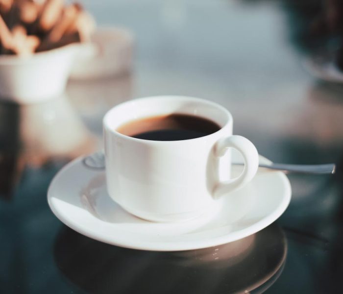 Кофеинът - обожаваната съставка на кафето - white cup with black coffee